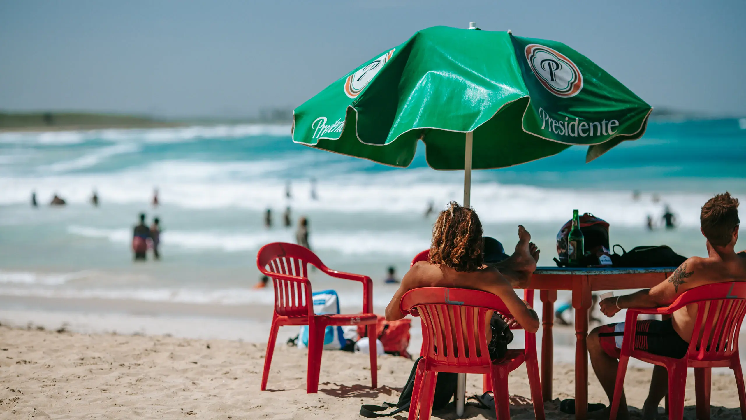 Boys relaxing by the beach